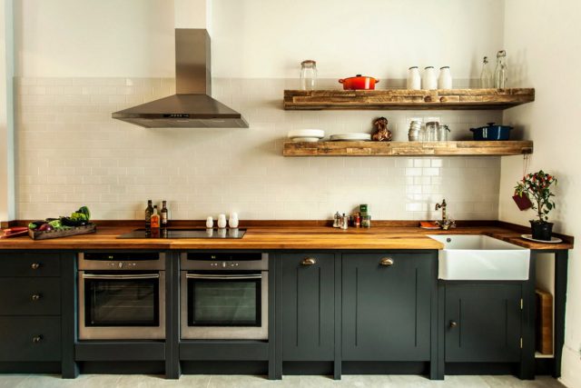 Open wooden shelves in the kitchen