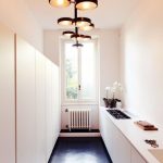Suspended chandeliers for a narrow kitchen